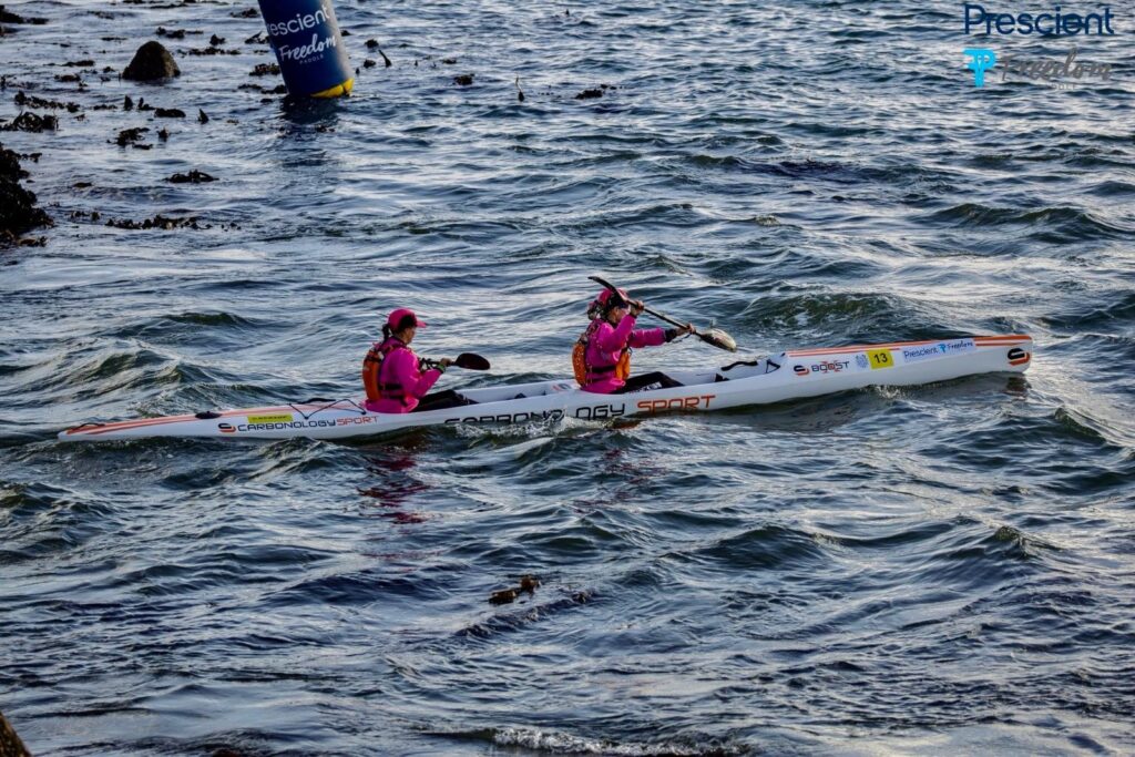 Angela Taylor and Bridget Boulle paddling their Carbonology Boost double surfski boat #13 at the 2026 Prescient Freedom Paddle around Robben Island