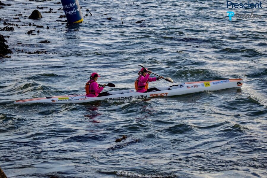 Angela Taylor and Bridget Boulle paddling their Carbonology Boost double surfski boat #13 at the 2026 Prescient Freedom Paddle around Robben Island